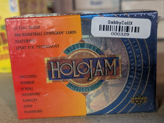 Holojam trading card pack with a label on a concrete floor.